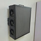Air filter mounted on a white wall