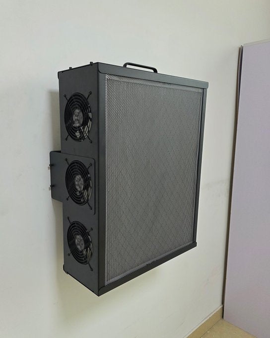 Air filter mounted on a white wall